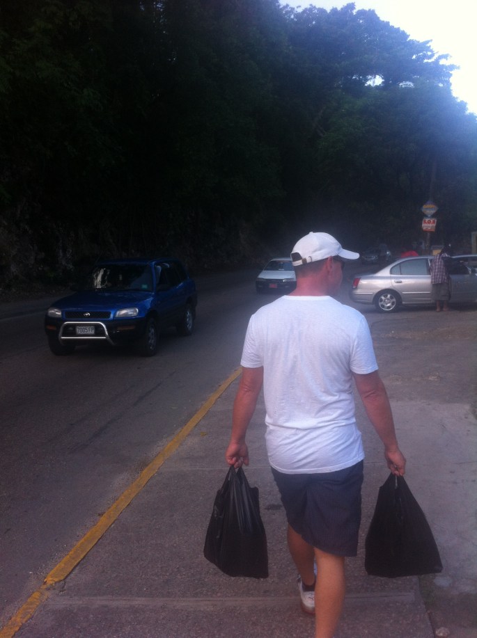 Michael walking back to the ship with the supermarket shopping in Ocho Rios, Jamaica.