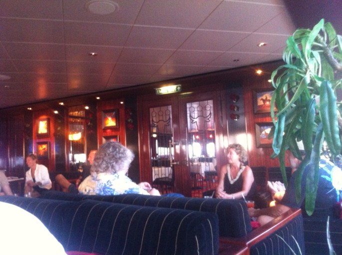 Happy hour at the Star Bar with two for one offers on the Norwegian Pearl.