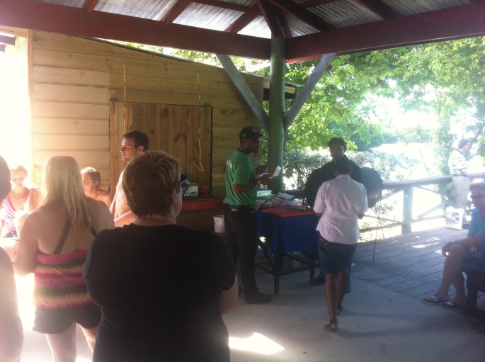 Under the pavilion where there is a photo buying kiosk, an area where you can buy souvenirs, a bar and this man making jerk chicken.  
