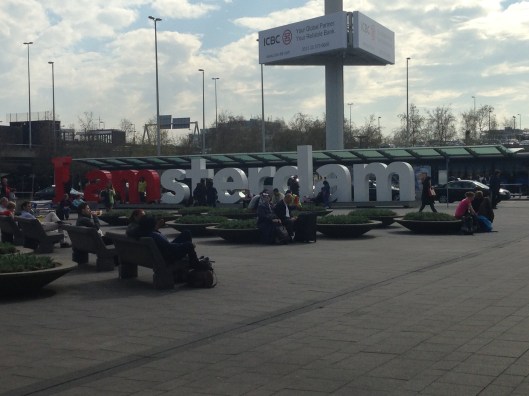 Outside the airport.  Frequent and quick trains connect the airport railway station to Haarlem often changing at Amsterdam Sloterdijk