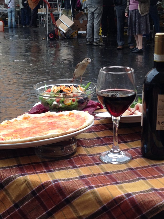 This little bird was anxious to eat salad and sip wine at Sloppy Sam's, Piazza Campo de Fiori, 9, 00186 Rome, Italy