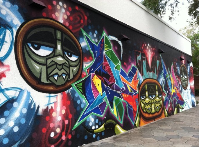 Street murals and street art is everywhere in the Central Arts District.  This piece is on First Avenue North behind the Morean Glass Studio & Hot Shop.