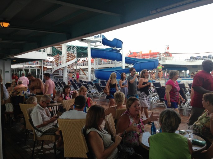 Life on deck of the Carnival Paradise by the pool was always fun and great for people meeting and people watching. 