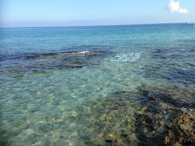 You can see the sand bags to cover the rough terrain at the put-in for snorkeling at Playa Corona, Cozumel, Mexico.