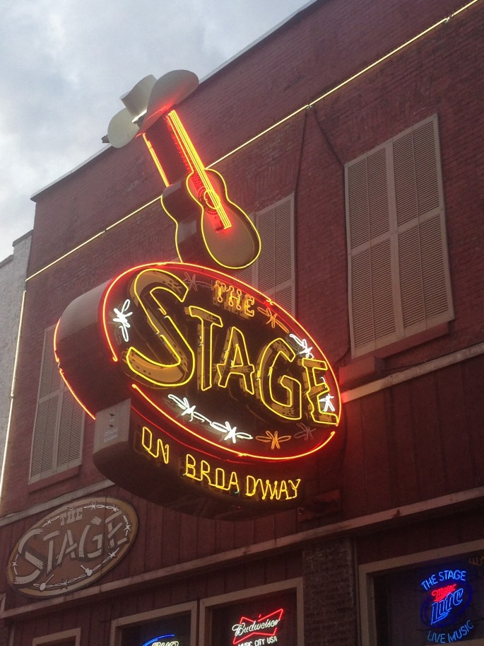 A neon sign for The Stage on Broadway in downtown Nashville, Tennessee. 