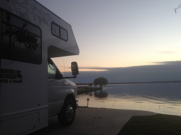 Our rented RV from Cruise America sat on a nice concrete pad with water views of Lake Livingston at the KOA in Onalaska, Texas.