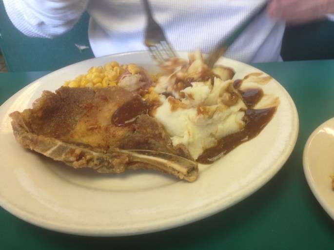 Good home cooked fried pork chops, mashed potatoes and corn is what you'll find at the Sentry Grill, Alexandria, Louisiana.