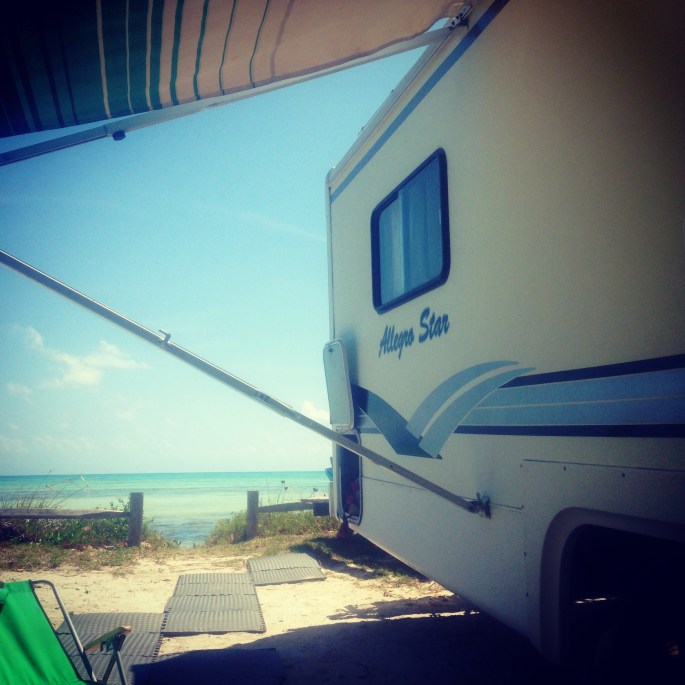 Oceanfront camping is perfect as we sit under our awning looking at the water at Long Key State Park.