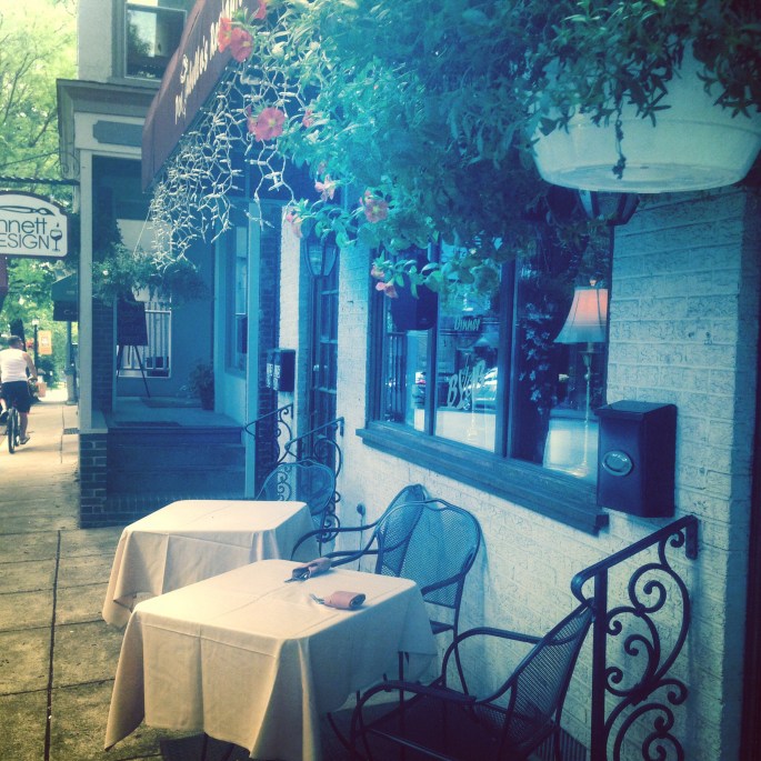 More shops and sidewalk cafes occupy the streets of Kennett Square, PA.