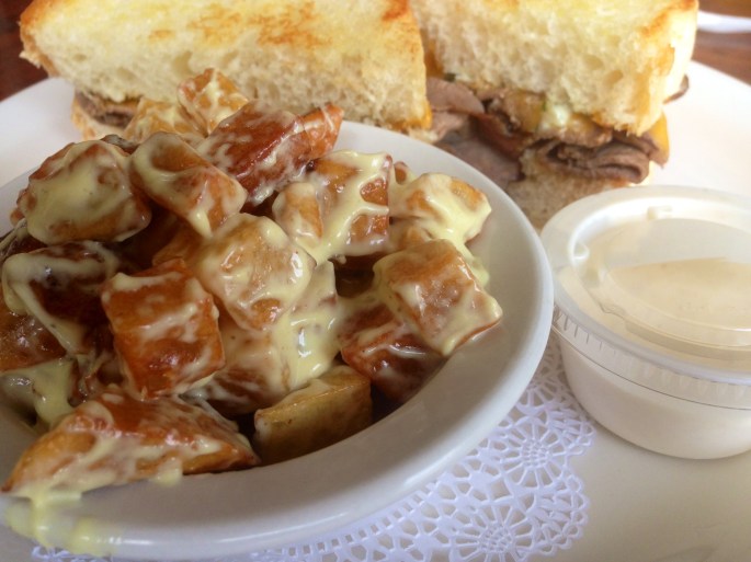 The Melty Beef with the fried potato salad at Tipsy McSway's in downtown Brunswick, Georgia.