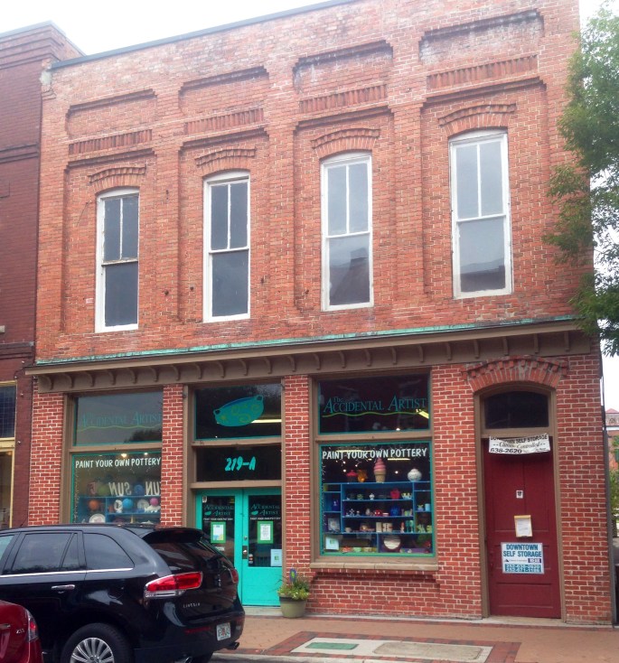 Downtown is filled with many charming brick buildings, including this one that houses a paint-your-own-pottery facility.